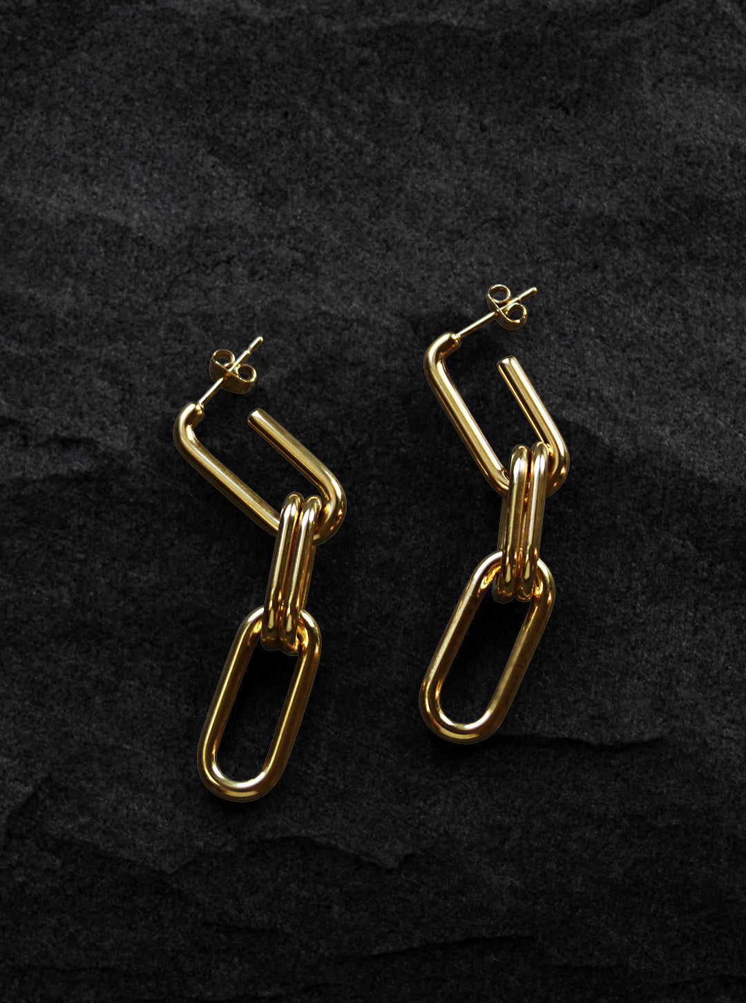 14 karat gold minimalist earrings in a paper clip design 