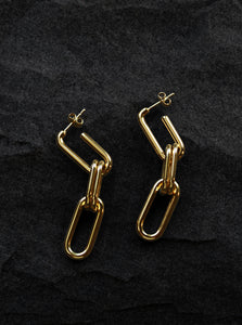 14 karat gold minimalist earrings in a paper clip design 